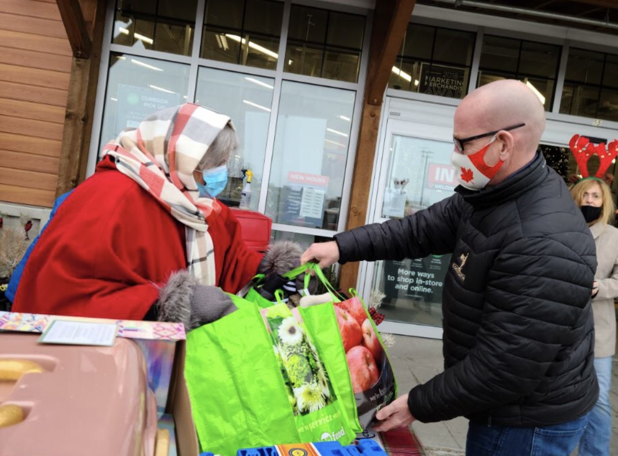 Cochranites donate food, toys & cash for annual StuffaBus event